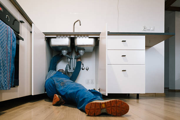 Professional Drain Cleaning technician working in Shelby, MS